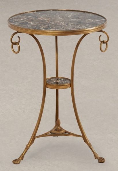 GUÉRIDON de forme ronde en bronze doré et...