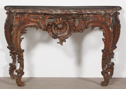 CONSOLE de forme mouvementée en bois naturel...