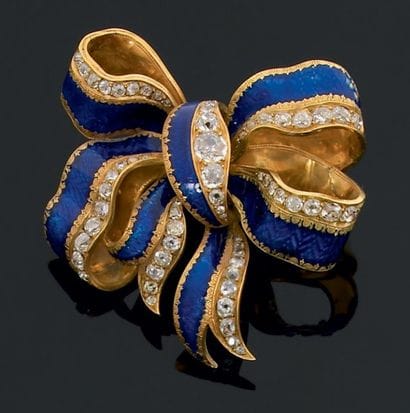 Broche noeud de ruban en or émaillé bleu...