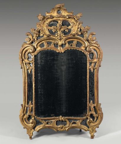 Miroir de forme mouvementée à double encadrement...