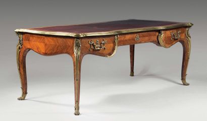 Bureau plat de forme galbée en placage de...
