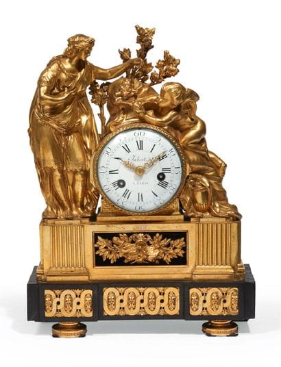PENDULE en bronze ciselé et doré, dite «Le...