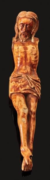 CHRIST en ivoire sculpté avec traces de décor...
