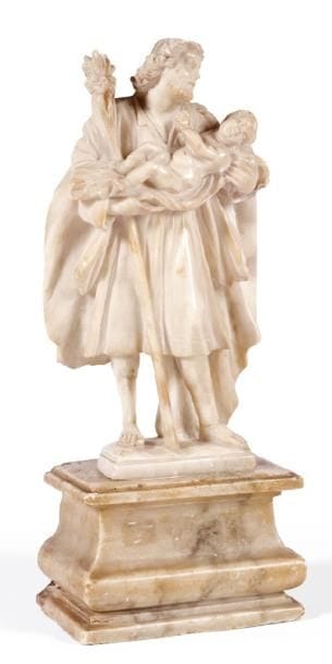 SAINT JOSEPH en albâtre sculpté en ronde-bosse.
Debout,...