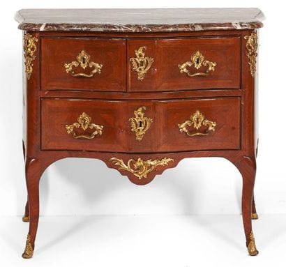 COMMODE en placage de bois de violette. Pieds...