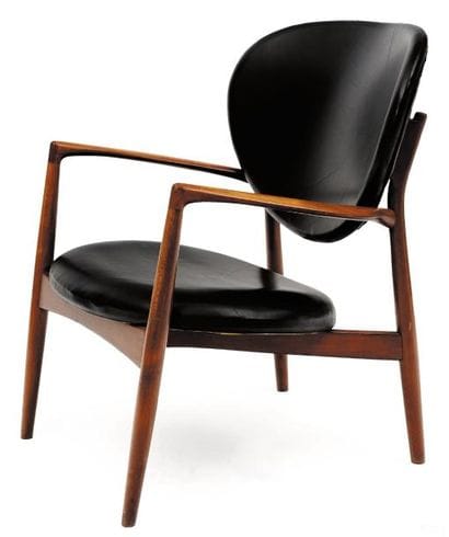 FINN JUHL (1912-1989)
Fauteuil. Teck et cuir...
