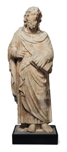 Saint en pierre calcaire sculptée. Dos creusé....