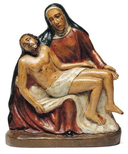 Vierge de pitié en noyer sculpté en rondebosse...