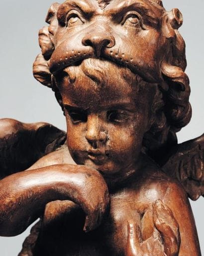 Suite de quatre angelots en bois sculpté,...