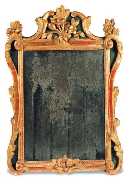 Petit miroir en bois peint et doré à décor...