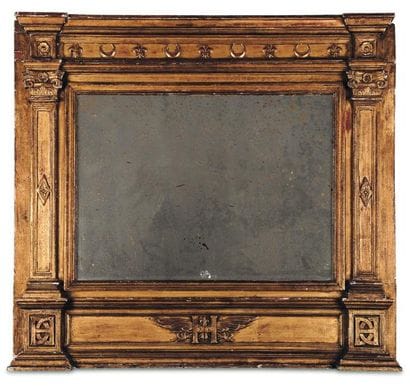 Miroir en bois doré à décor de fl eurs de...