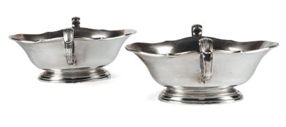 Paire de saucières en argent. elles sont...