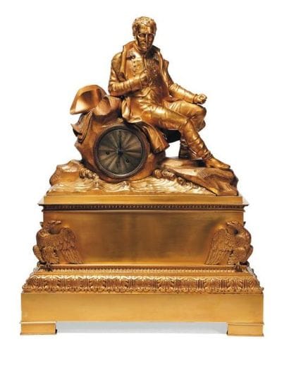 Pendule en bronze doré représentant napoléon...