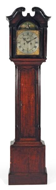 Horloge en acajou, placage d'acajou et chêne...
