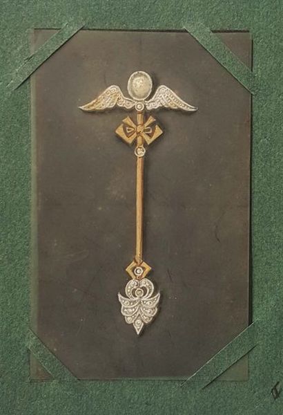 EPINGLE DE JABOT en or 18K (750), ornée d'un...