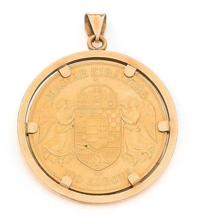 PENDENTIF en or 18K (750), orné d'une pièce...