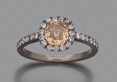 BAGUE en or gris 18K (750) ornée d'un diamant...