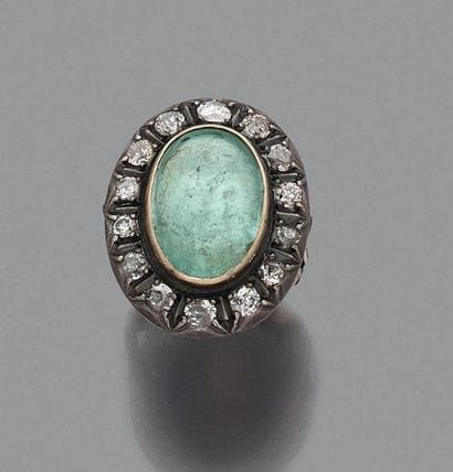 BAGUE en or jaune 18K (750) et argent ornée...