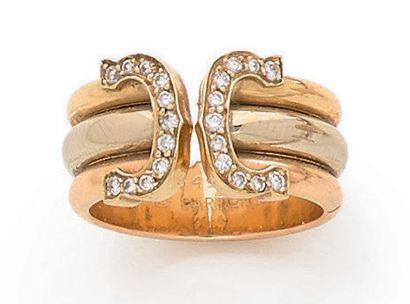CARTIER MODÈLE «DOUBLE C».
Bague en trois...