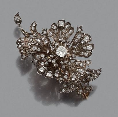 BROCHE trembleuse en or jaune 18K (750) et...