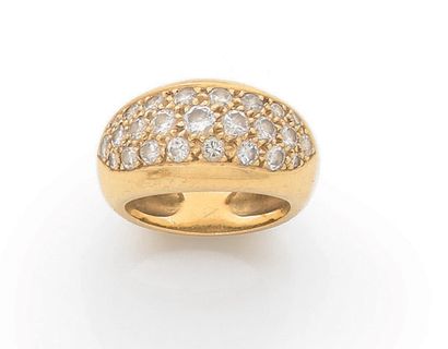 BAGUE BOMBÉE en or jaune 18K (750) agrémentée...