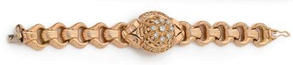 MONTRE DE DAME en or jaune 18K (750), le...