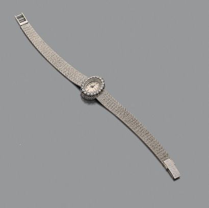 BUCHERER, vers 1960
No 22590
Montre bracelet...