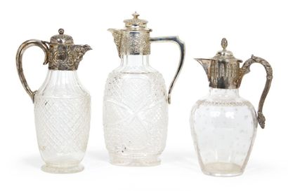 TROIS CARAFES EN CRISTAL TAILLE ET MONTURES...