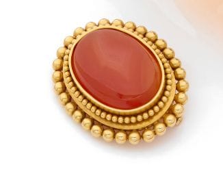 BROCHE ovale en or jaune 18K (750) à bordure...