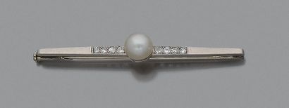 BOUCHERON
Broche-barrette en platine et or...