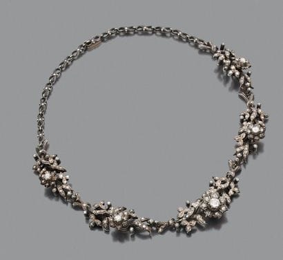 COLLIER en or 14K (585) et argent, le décolleté...