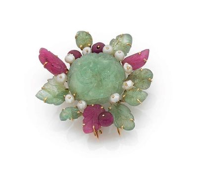BROCHE en or jaune 18K (750) formant un motif...