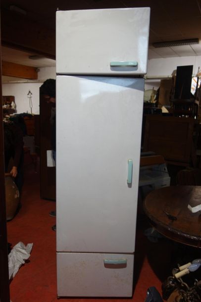 Enamelled metal cabinet with three doors....
