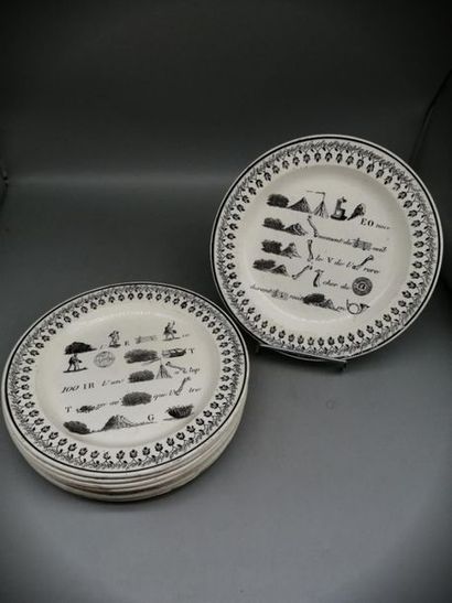 SET OF TEN EARTHENWARE PLATES WITH REBUS...