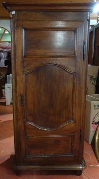 Natural wood hatch opening to a triple panel...