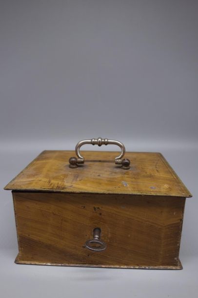 Metal box forming a case with its key. 