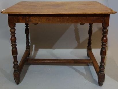 Walnut desk table, turned legs joined by...