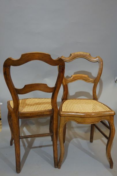 Pair of walnut chairs, caned seats. Accidents....
