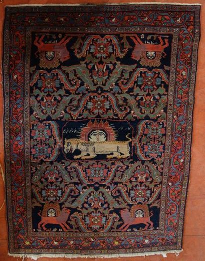 Knotted-stitch woollen rug decorated with...