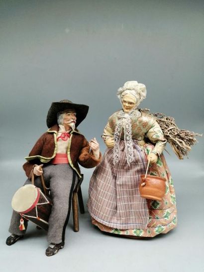 Pair of large SANTONS in terracotta and fabric....