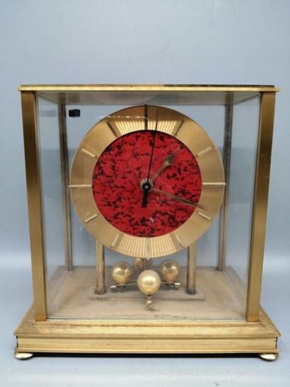 HETTICH, gilded metal cage clock. 