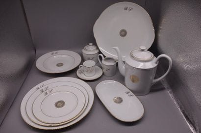 Limoges porcelain dinner service with a gilded...