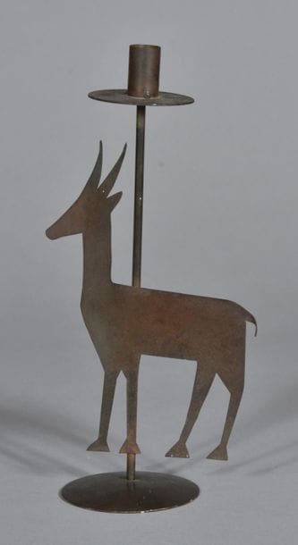 Iron candlestick cut from a gazelle.