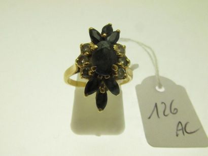 1 gold ring, openworked and moving basket,...