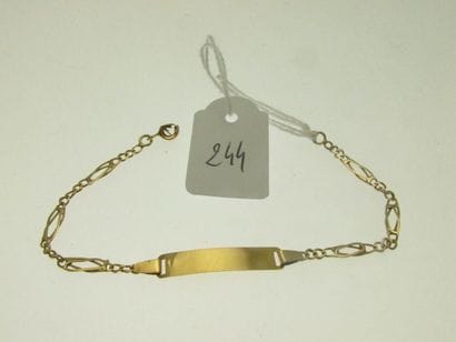 1 child's identity bracelet gold, unengraved...