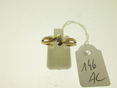 1 gold ring set with a small brilliant-cut...