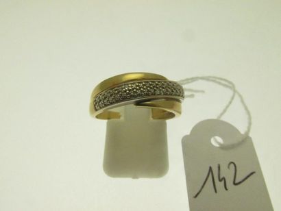 1 ring set in two-tone gold with a transverse...