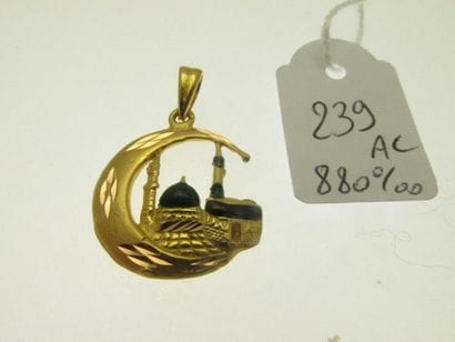 1 pendant in 880°/°° gold with chiselled,...
