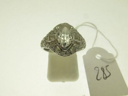 1 platinum setting ring set with an oval...