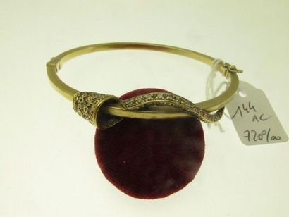 1 rigid bracelet opening in 720°/°°° gold...